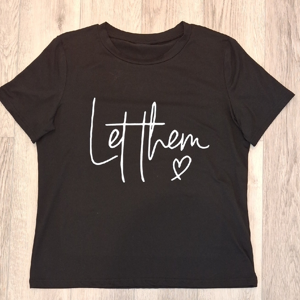 Chic Black Tee with White Script by [Brand]